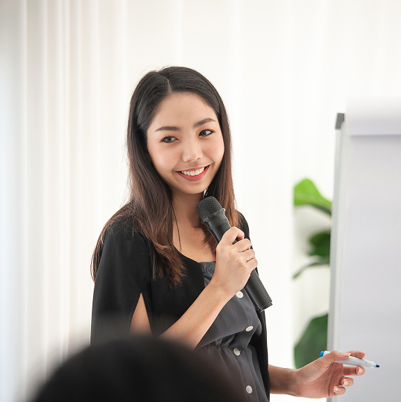 portrait smiling young woman using phone