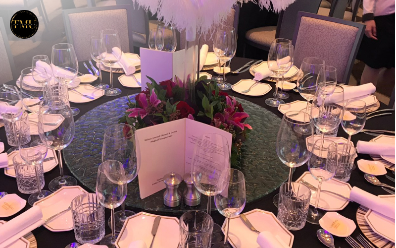 Elegantly set table at a corporate dinner and dance event